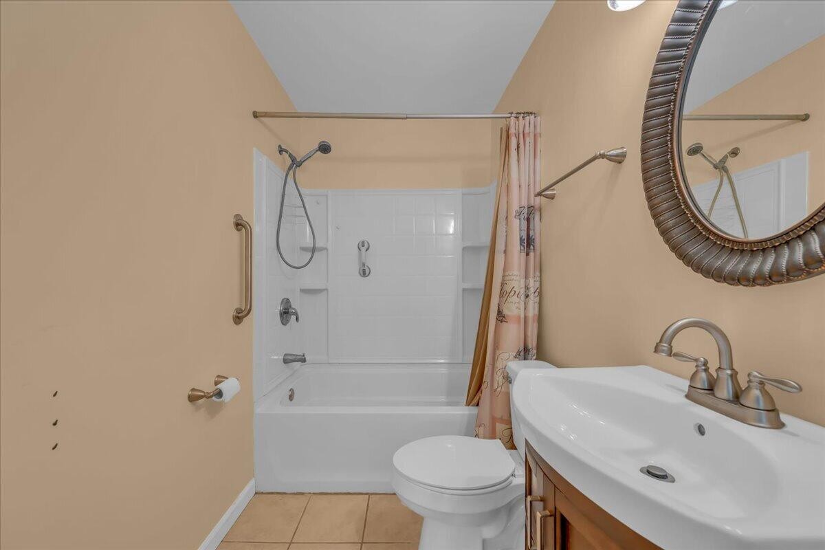 120 Raulstontown Road South Pittsburg, TN 37380 - Photo 19 of 22 a bathroom with a sink a toilet and shower