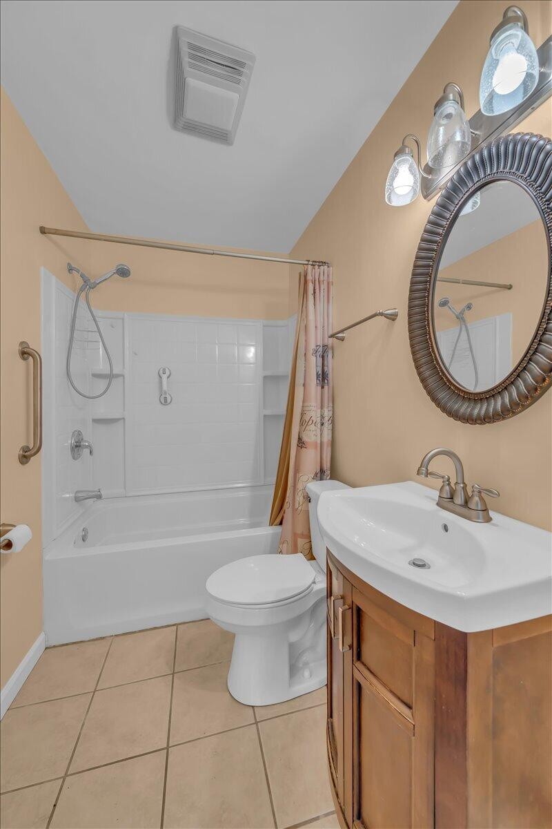 120 Raulstontown Road South Pittsburg, TN 37380 - Photo 20 of 22 a bathroom with a sink a toilet and a mirror