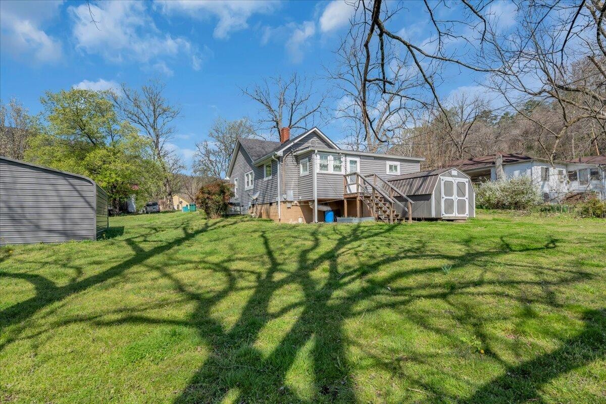 120 Raulstontown Road South Pittsburg, TN 37380 - Photo 2 of 22 a view of a house with a big yard