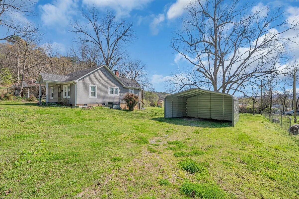 120 Raulstontown Road South Pittsburg, TN 37380 - Photo 21 of 22 a view of a house with a yard