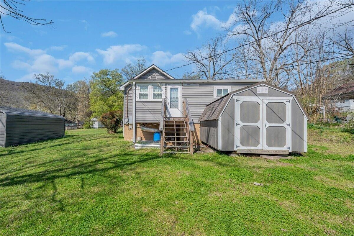 120 Raulstontown Road South Pittsburg, TN 37380 - Photo 3 of 22 a view of a house with a yard