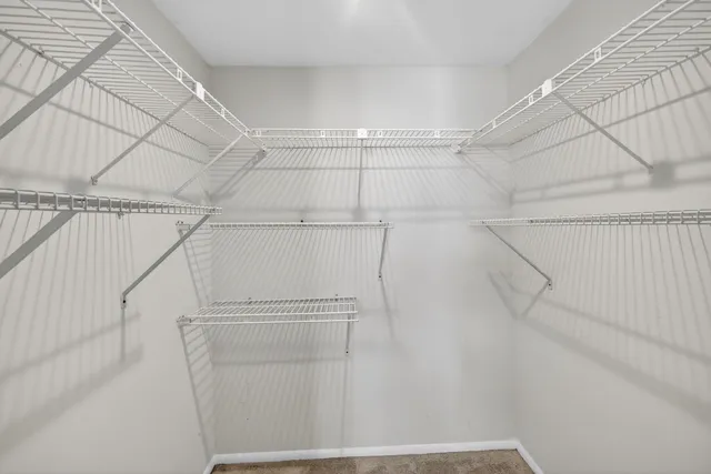 a view of a room with racks on the wall