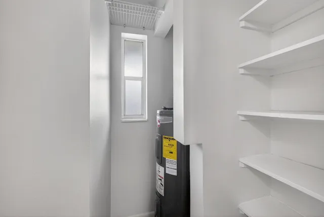 a bathroom with a toilet and a sink