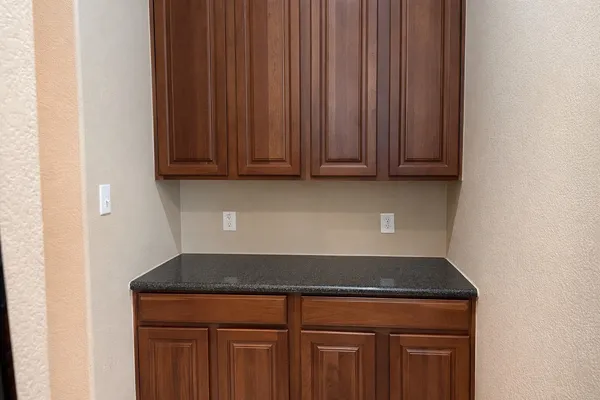 a view of a sink and dishwasher in a kitchen