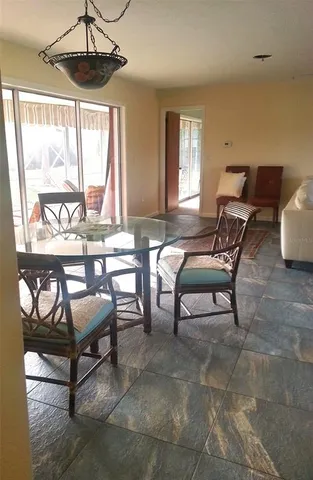 a outdoor living space with furniture and a window