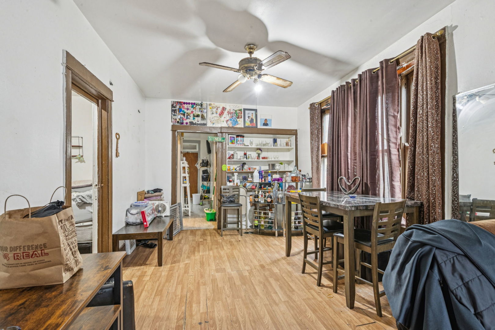 1012 North Ridgeway Avenue Chicago, IL 60651 - Photo 14 of 31 a view of a livingroom with furniture and hardwood floor