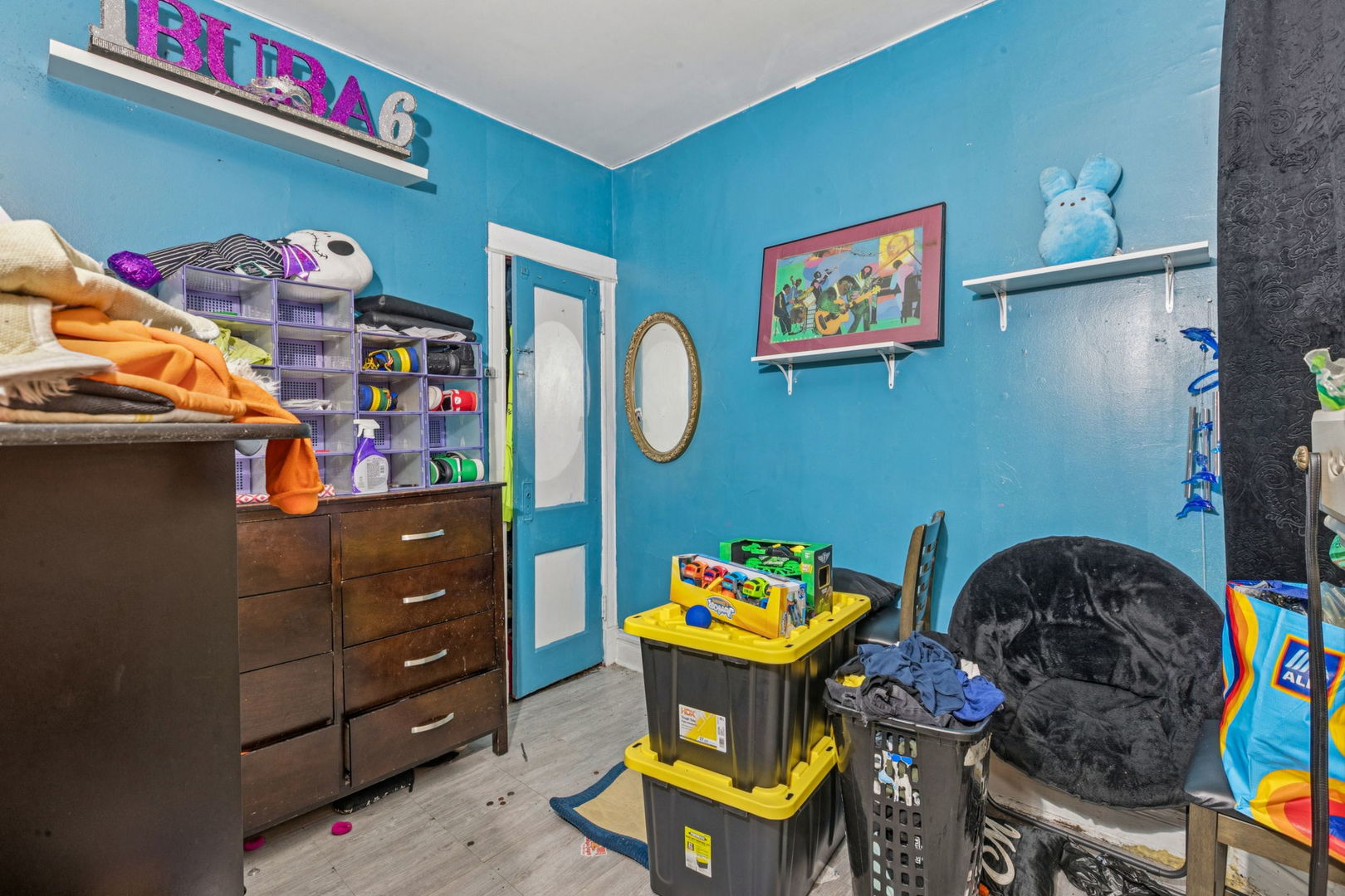 1012 North Ridgeway Avenue Chicago, IL 60651 - Photo 18 of 31 a living room with furniture and a baby crib