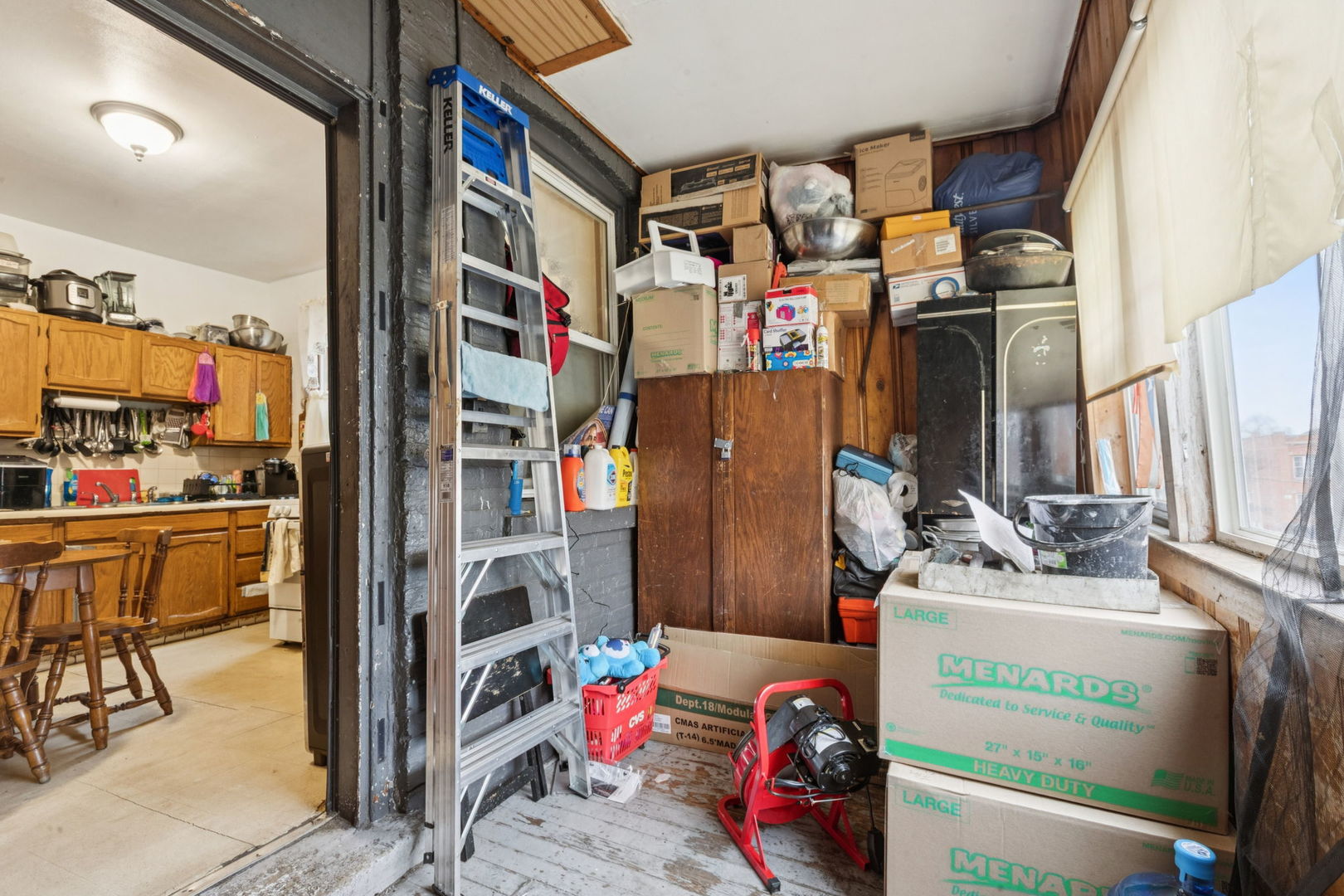1012 North Ridgeway Avenue Chicago, IL 60651 - Photo 6 of 31 a utility room with lot of items and toys