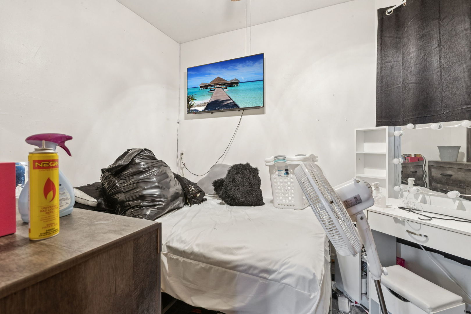 1012 North Ridgeway Avenue Chicago, IL 60651 - Photo 10 of 31 a bedroom with a bed and a table