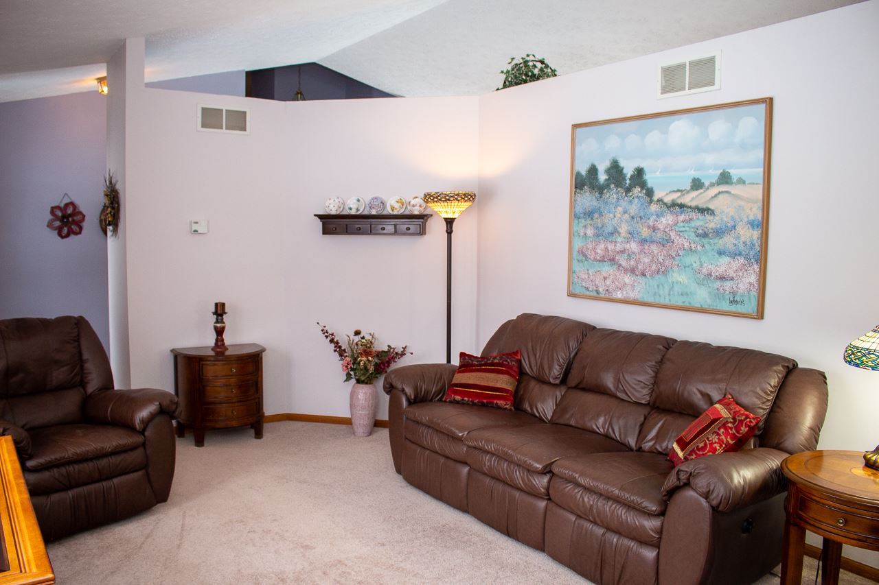 7073 Rye Ridge Trail Cherry Valley, IL 61016 - Photo 3 of 24 a living room with furniture and a couch