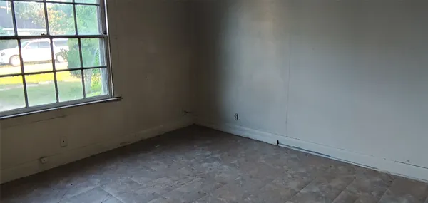 an empty room with a window