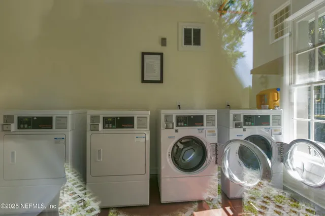 a utility room with dryer and washer