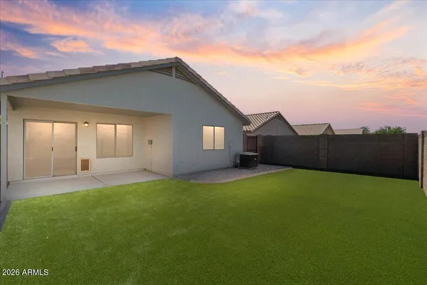 a view of a backyard with a garden