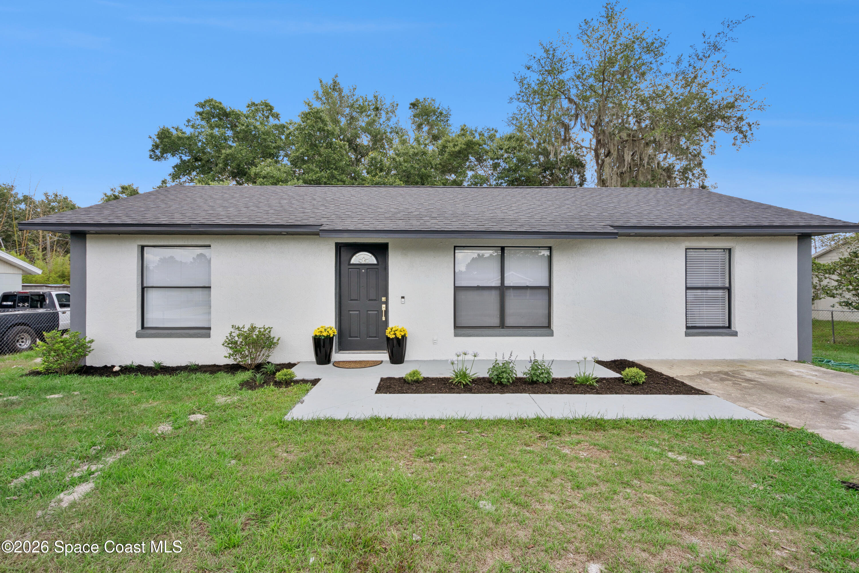 65 South Courtland Boulevard Deltona, FL 32738 - Photo 1 of 27 Front of house