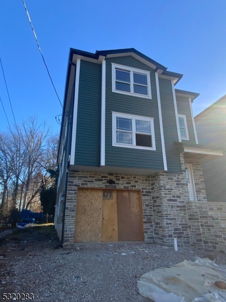 307 Chilton Street Elizabeth, NJ 07208 - Photo 1 of 10 a front view of a house