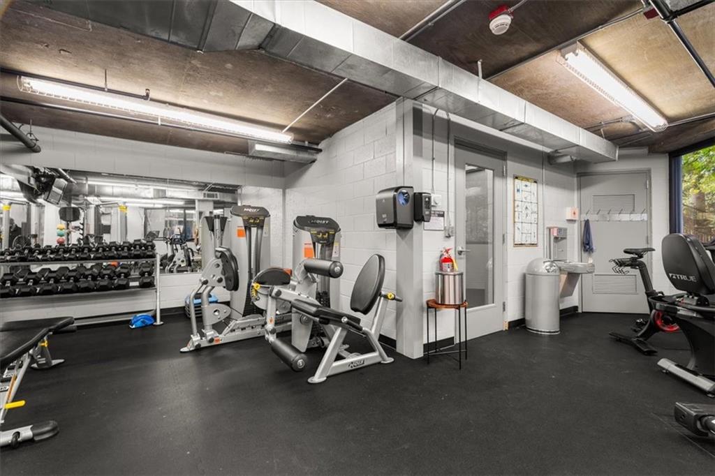 3235 Roswell Road Northeast, Unit 609 Atlanta, GA 30305 - Photo 26 of 30 a view of a room with gym equipment