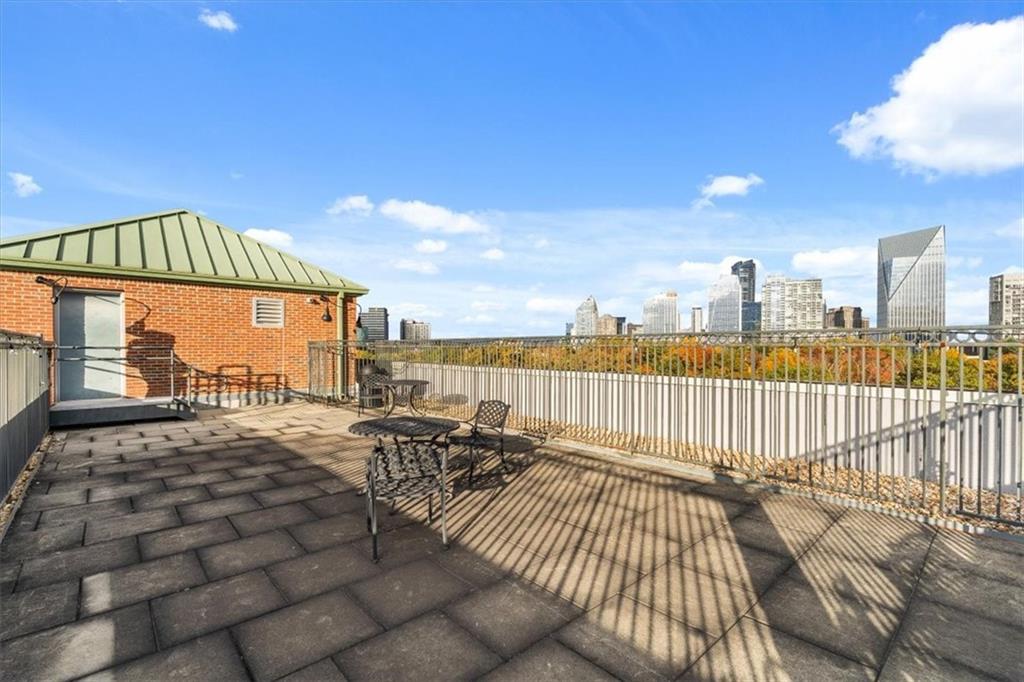 3235 Roswell Road Northeast, Unit 609 Atlanta, GA 30305 - Photo 28 of 30 a view of balcony with furniture
