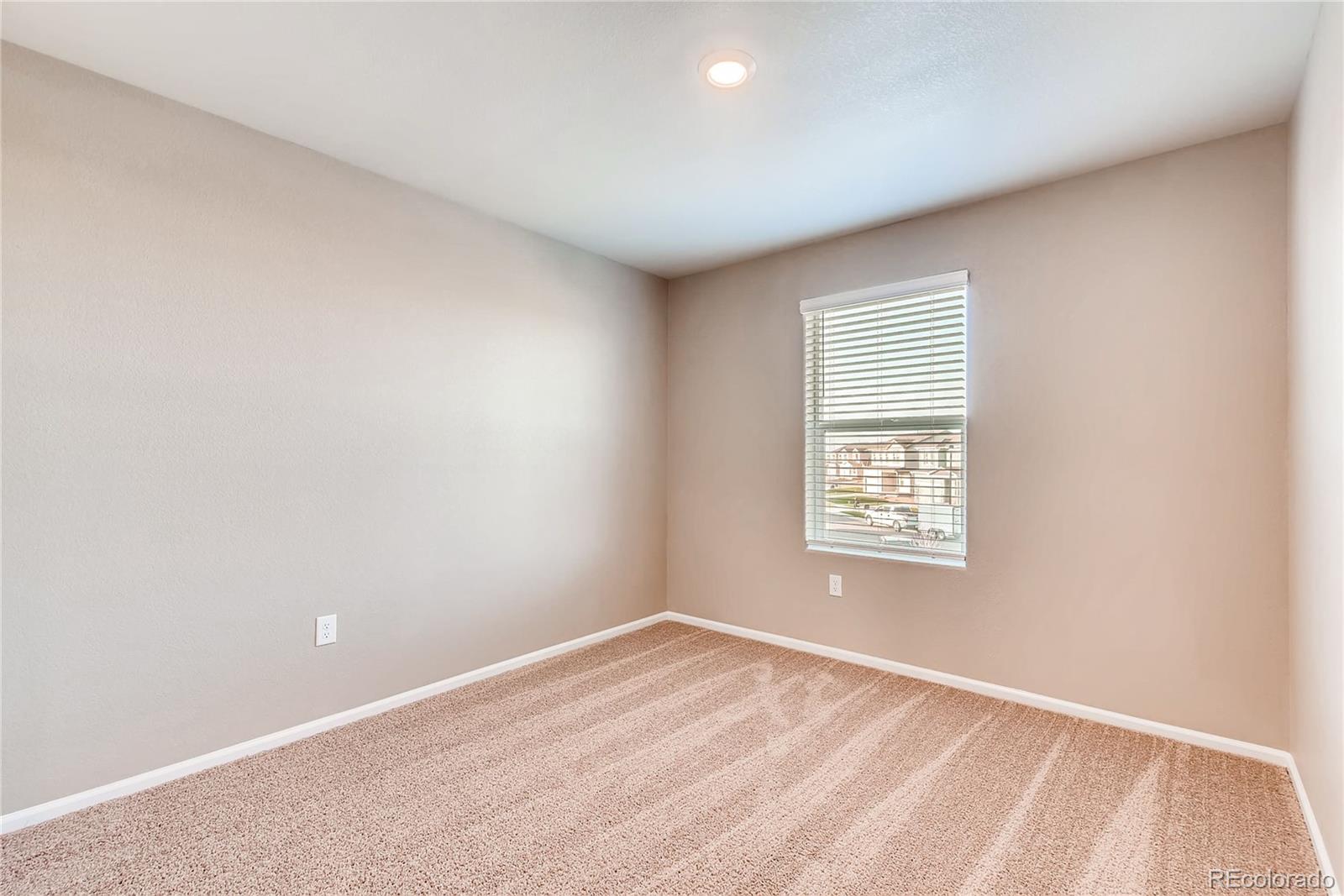 7132 Shavano Circle Frederick, CO 80504 - Photo 13 of 14 an empty room with a window