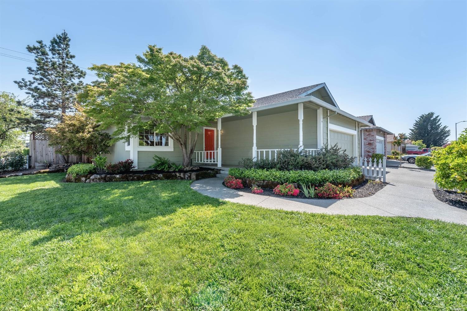 2420 Basque Court Santa Rosa, CA 95403 - Photo 1 of 1 a front view of a house with a garden and plants