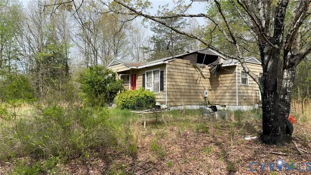 a backyard of a house with lots of green space