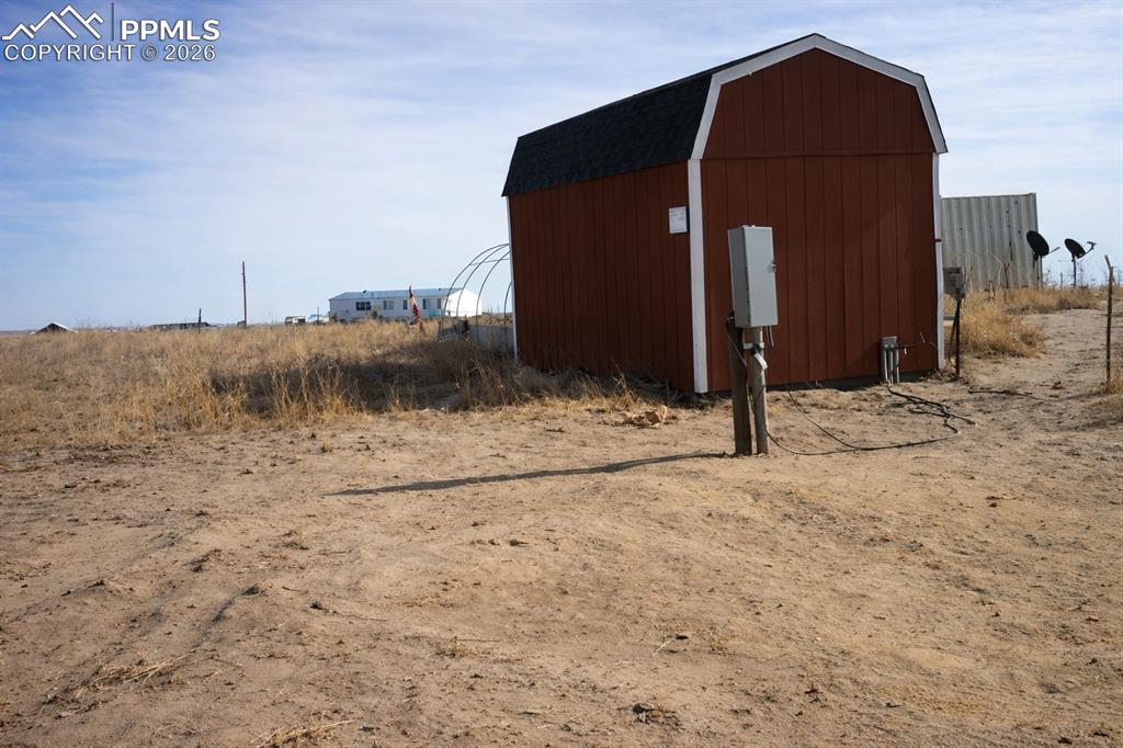 24555 Myers Road Colorado Springs, CO 80928 - Photo 7 of 10 a backyard of a house