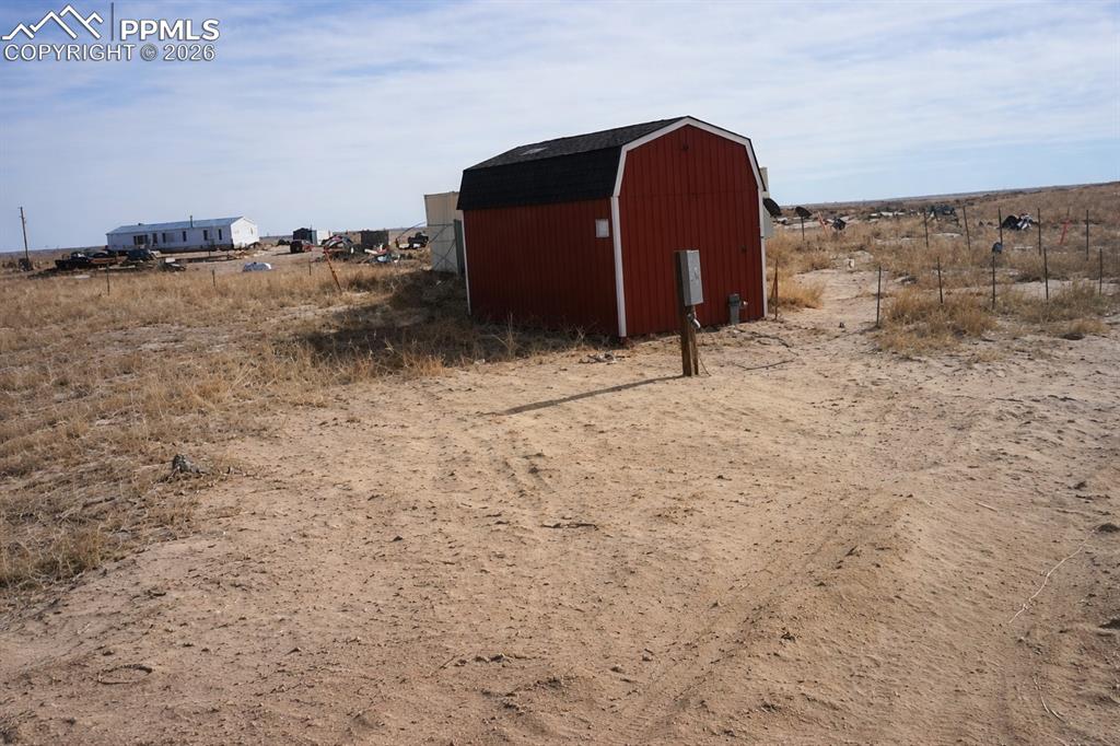 24555 Myers Road Colorado Springs, CO 80928 - Photo 8 of 10 a view of a backyard