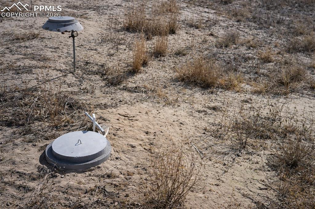 24555 Myers Road Colorado Springs, CO 80928 - Photo 9 of 10 a bathroom with a toilet and a sink