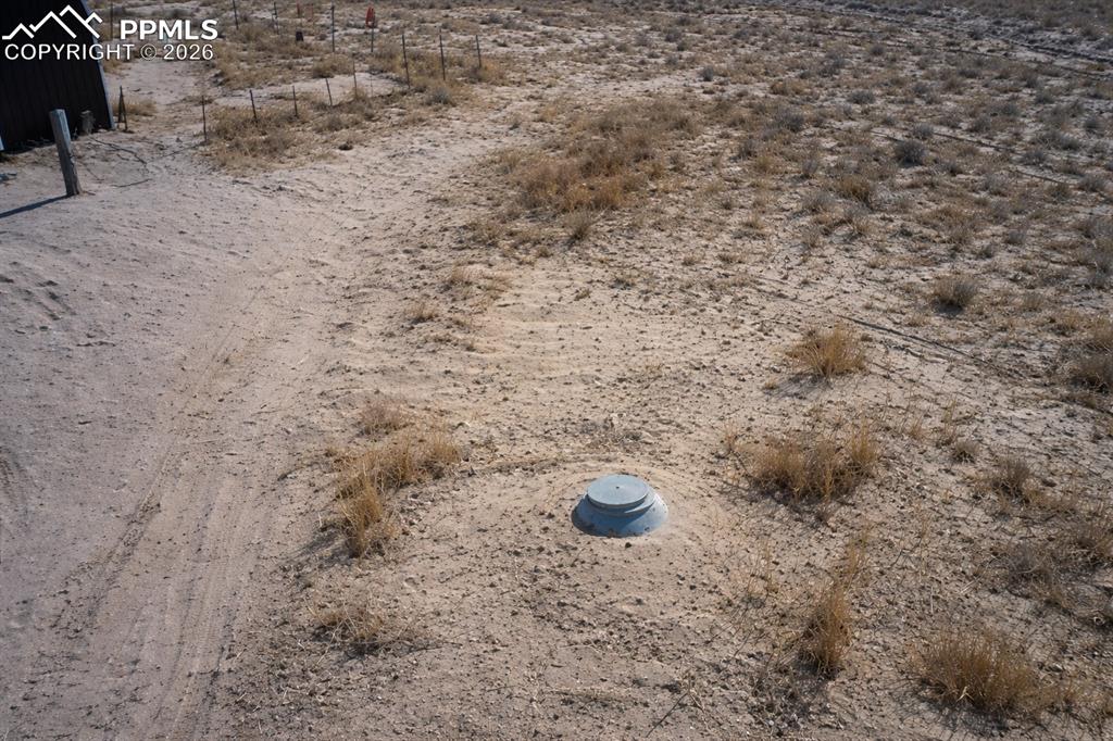24555 Myers Road Colorado Springs, CO 80928 - Photo 10 of 10 a view of a dry yard with trees