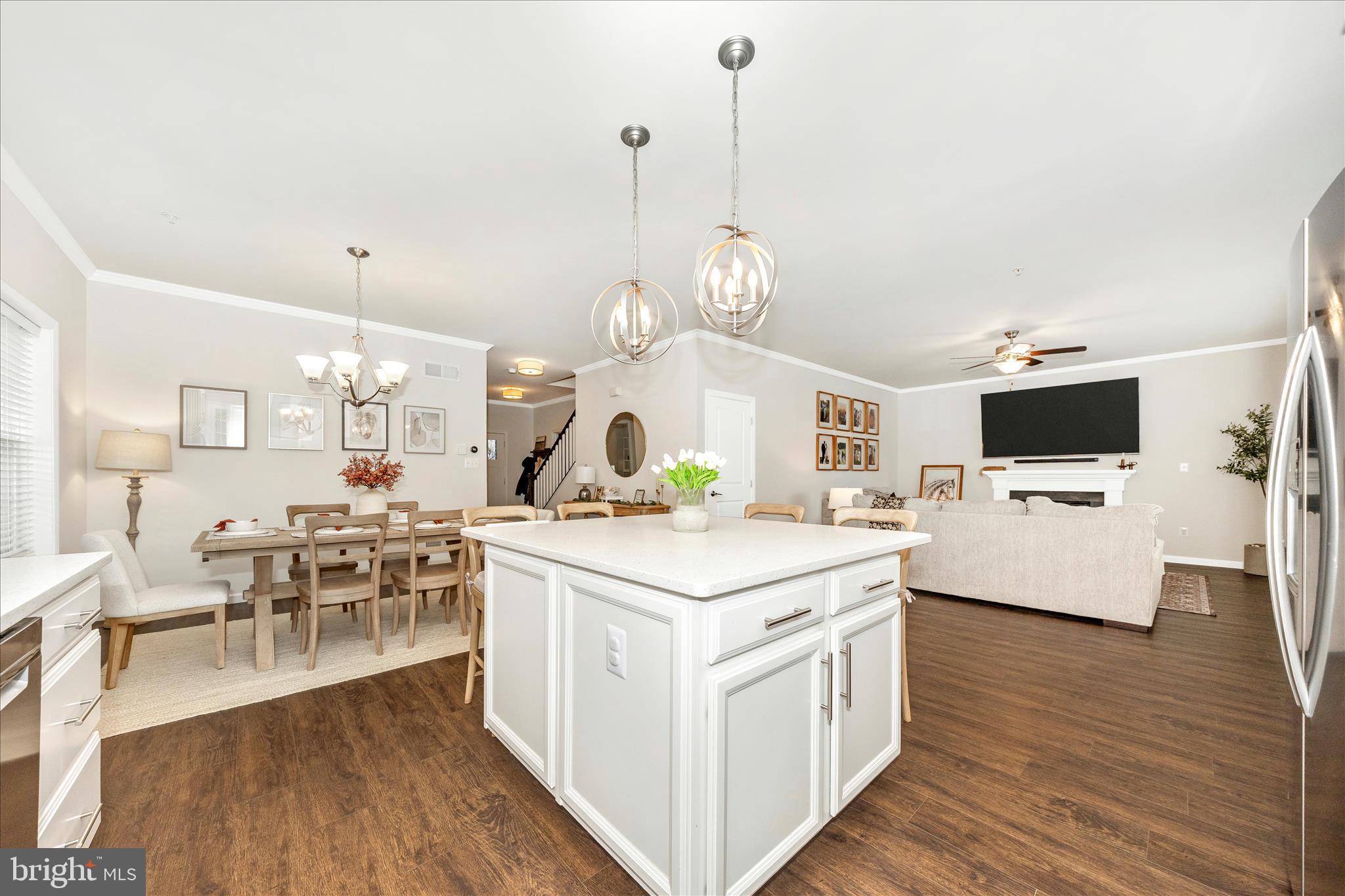 1600 Hobble Trail Frederick, MD 21702 - Photo 20 of 48 a open kitchen with stainless steel appliances kitchen island a white cabinets and wooden floor