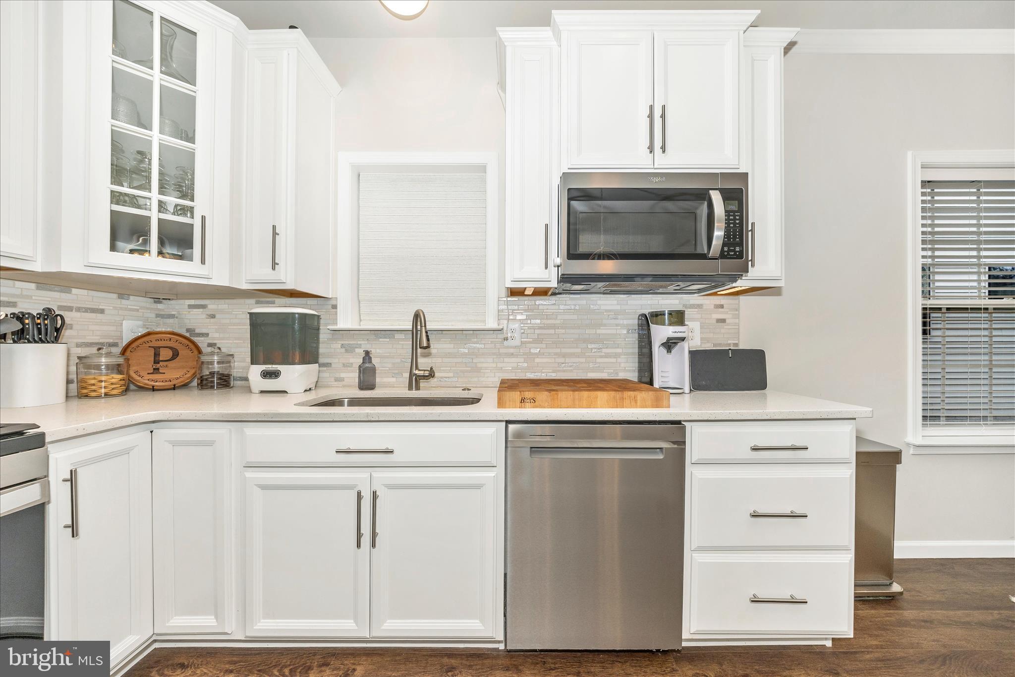 1600 Hobble Trail Frederick, MD 21702 - Photo 22 of 48 a kitchen with cabinets stainless steel appliances and a sink