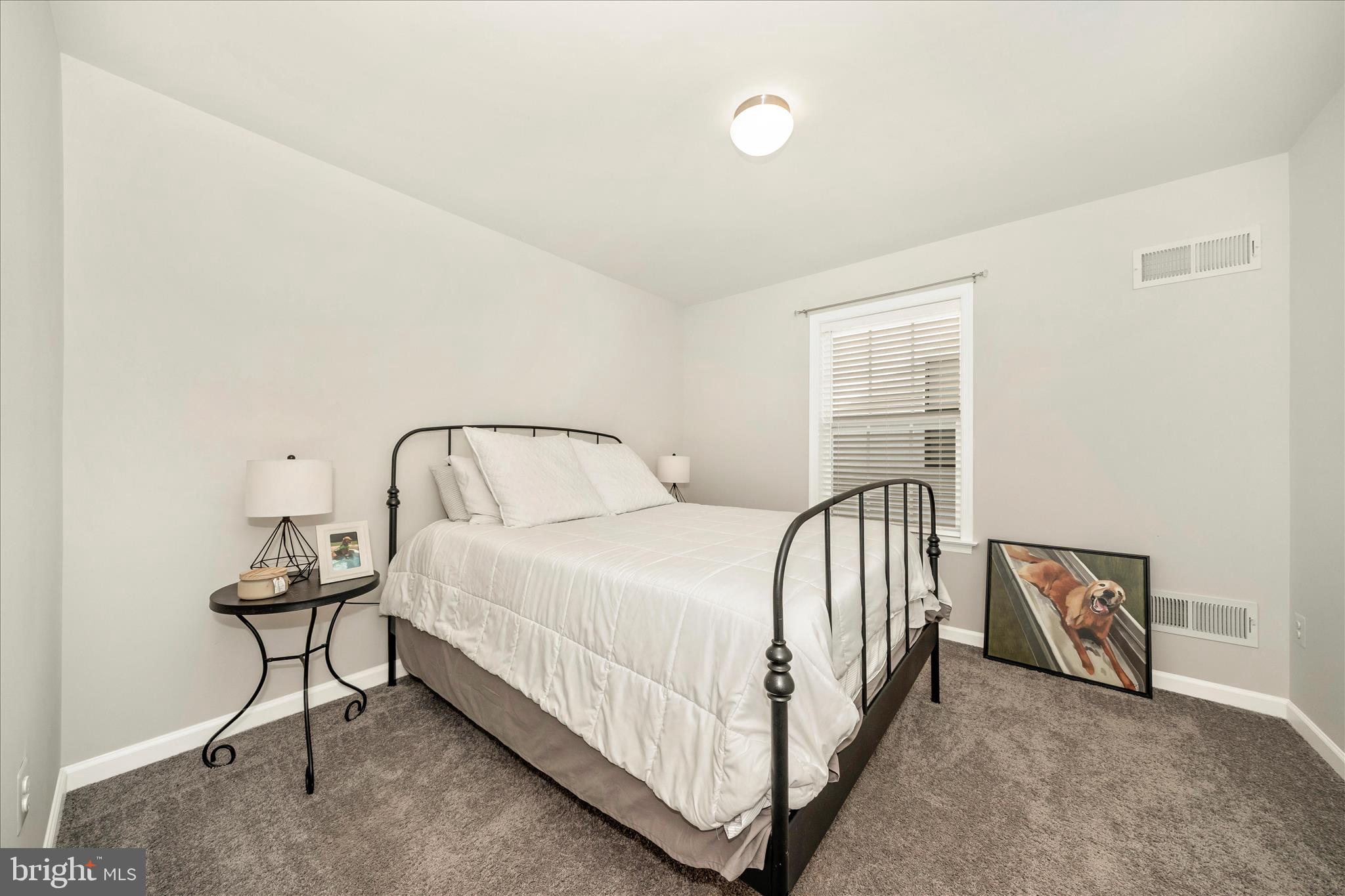 1600 Hobble Trail Frederick, MD 21702 - Photo 32 of 48 a bedroom with a bed and a window