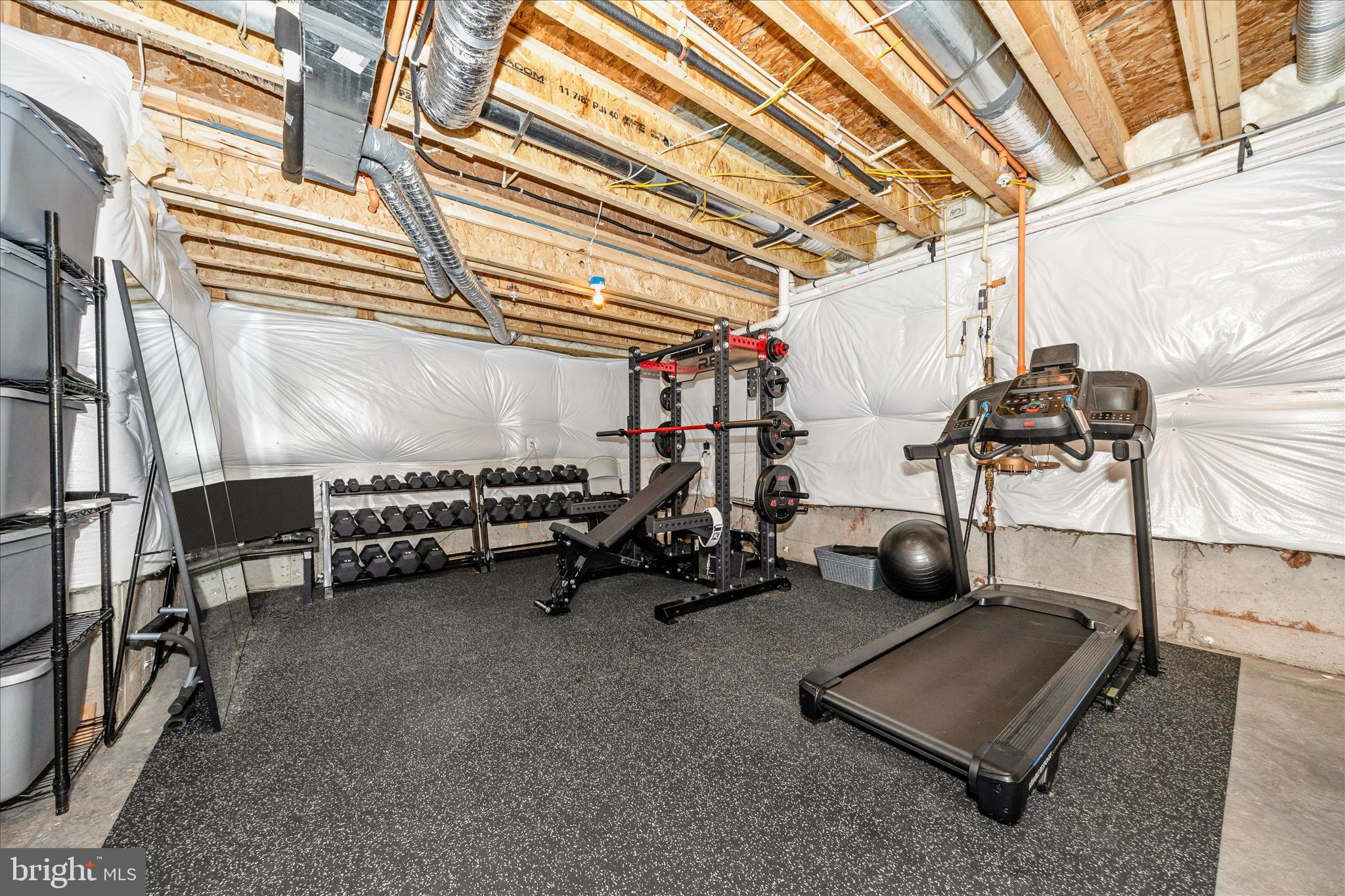 1600 Hobble Trail Frederick, MD 21702 - Photo 36 of 48 a view of a room with gym equipment