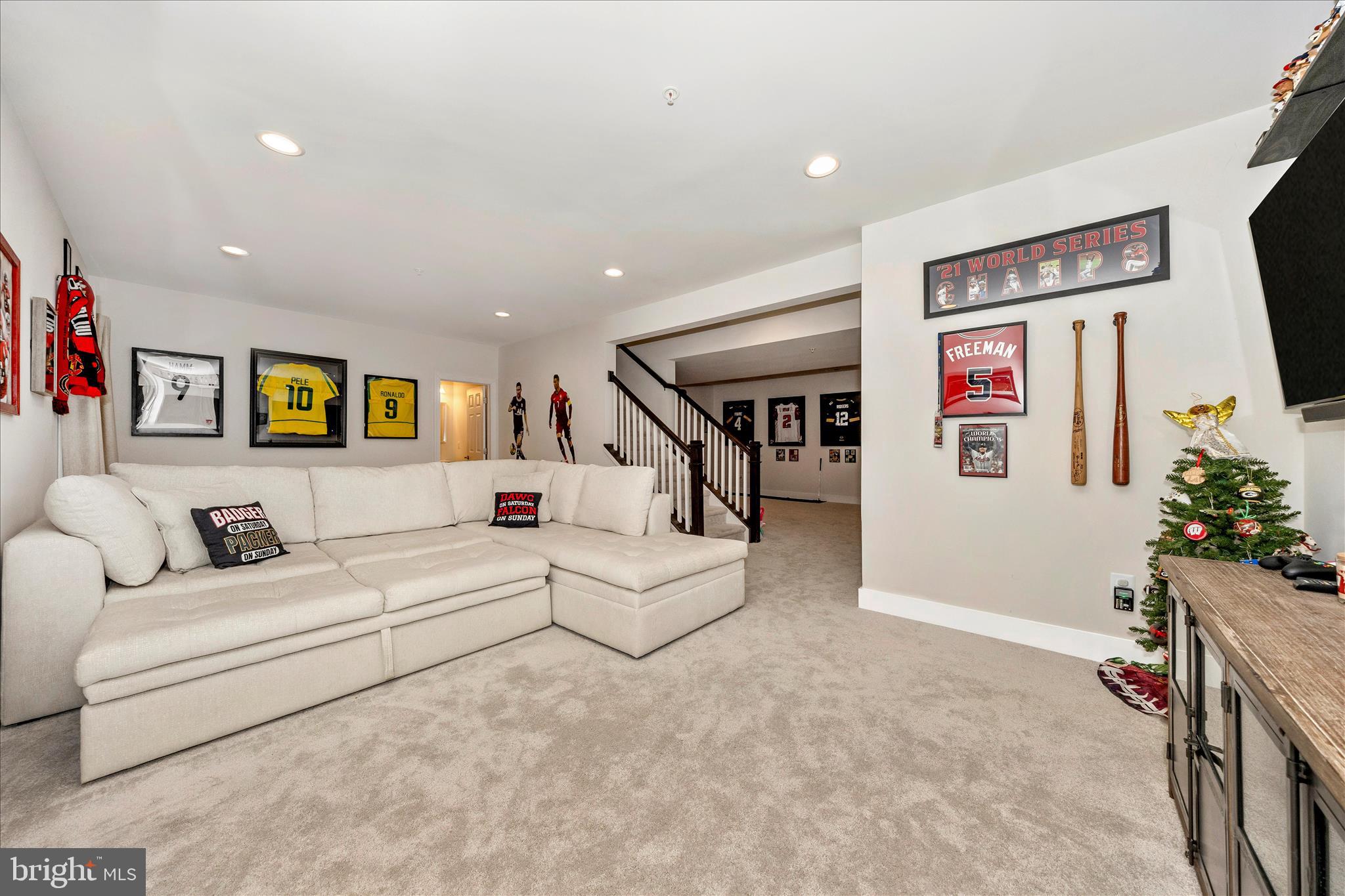1600 Hobble Trail Frederick, MD 21702 - Photo 39 of 48 a living room with furniture and a flat screen tv