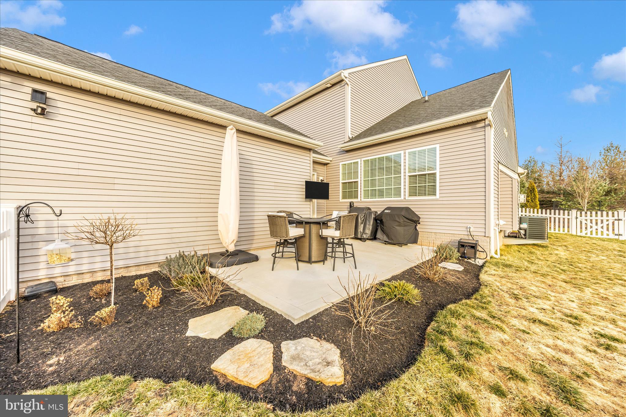 1600 Hobble Trail Frederick, MD 21702 - Photo 4 of 48 a view of a dining table and chairs in the patio