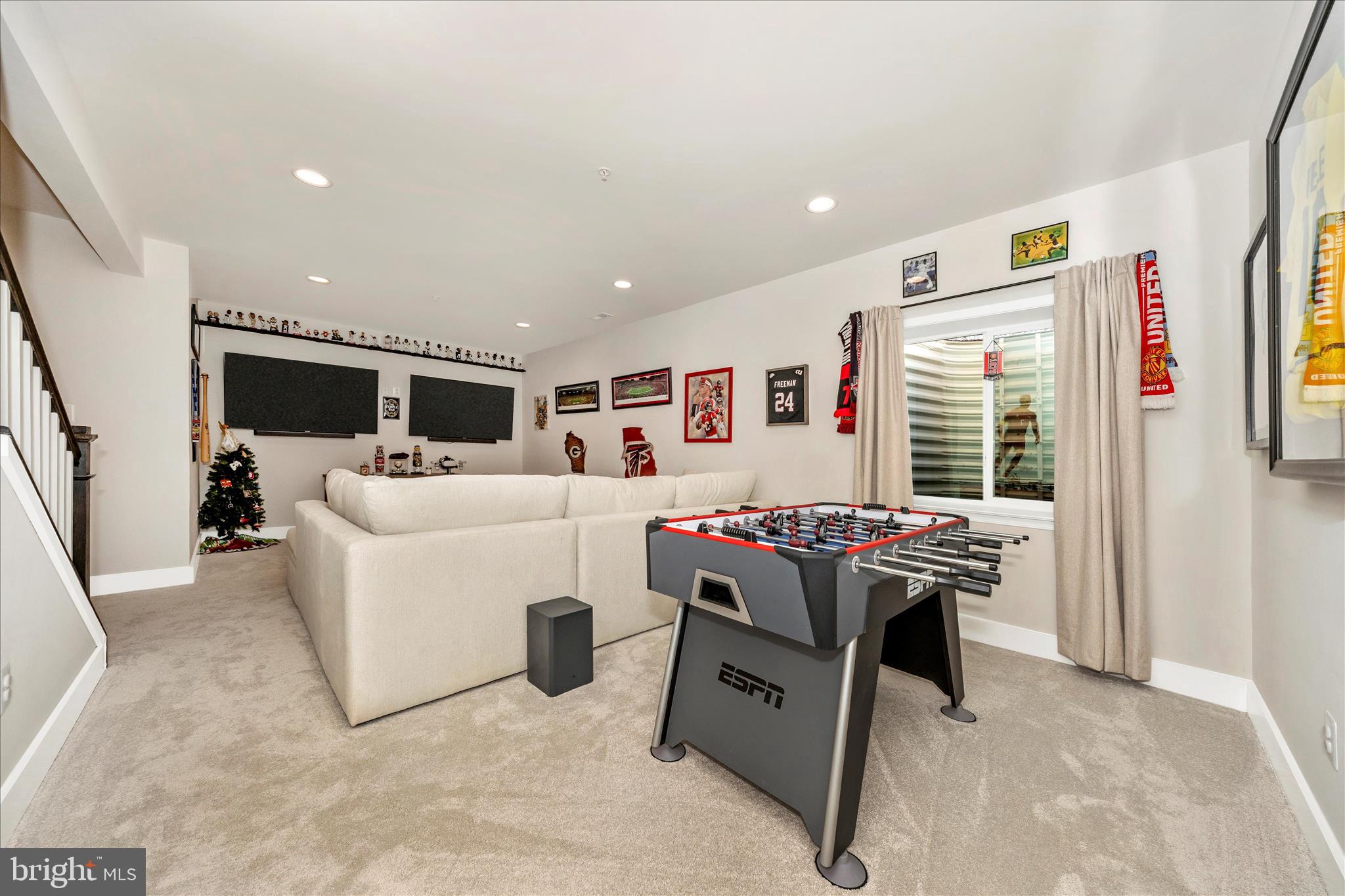 1600 Hobble Trail Frederick, MD 21702 - Photo 40 of 48 a living room with furniture and a flat screen tv