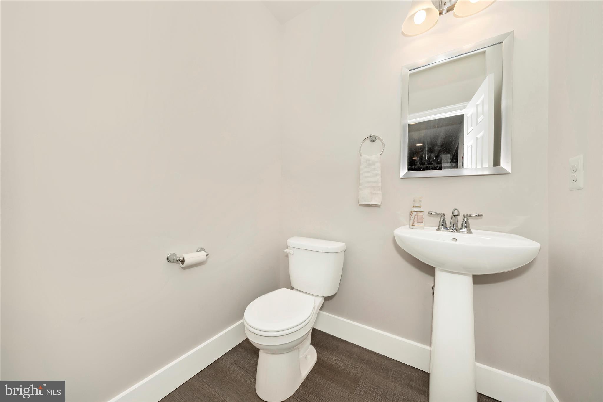 1600 Hobble Trail Frederick, MD 21702 - Photo 41 of 48 a bathroom with a sink a toilet and mirror