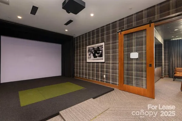 a living room with a couch and a fireplace