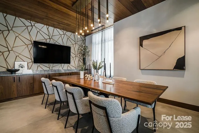 a living room with large windows