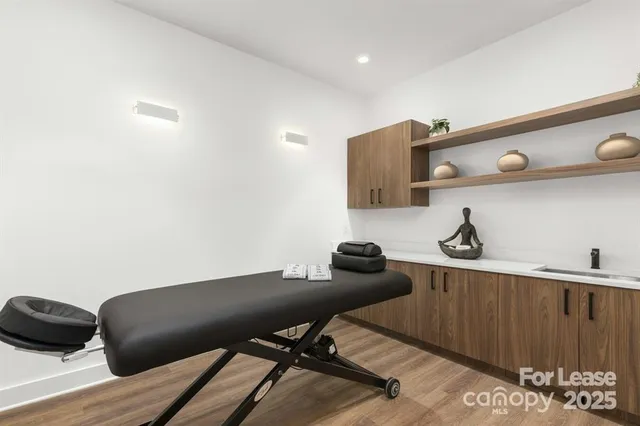 a outdoor living space with furniture and a rug