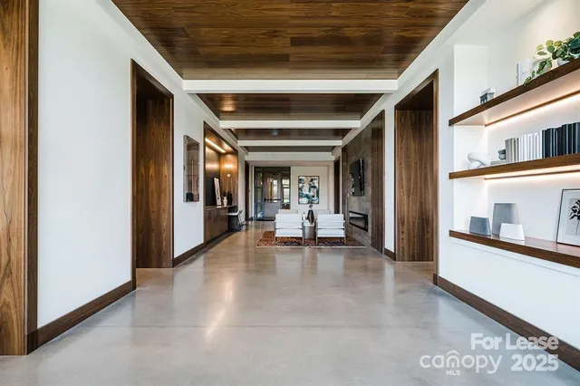 an entryway of a house with wooden floor