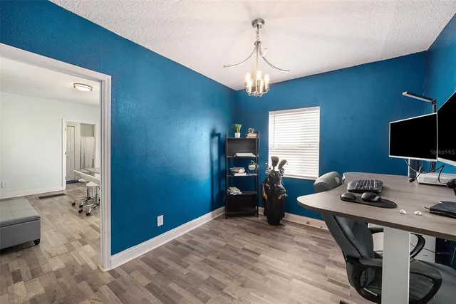 a view of a livingroom with furniture and window