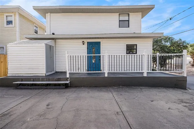 a front view of a house with a couch