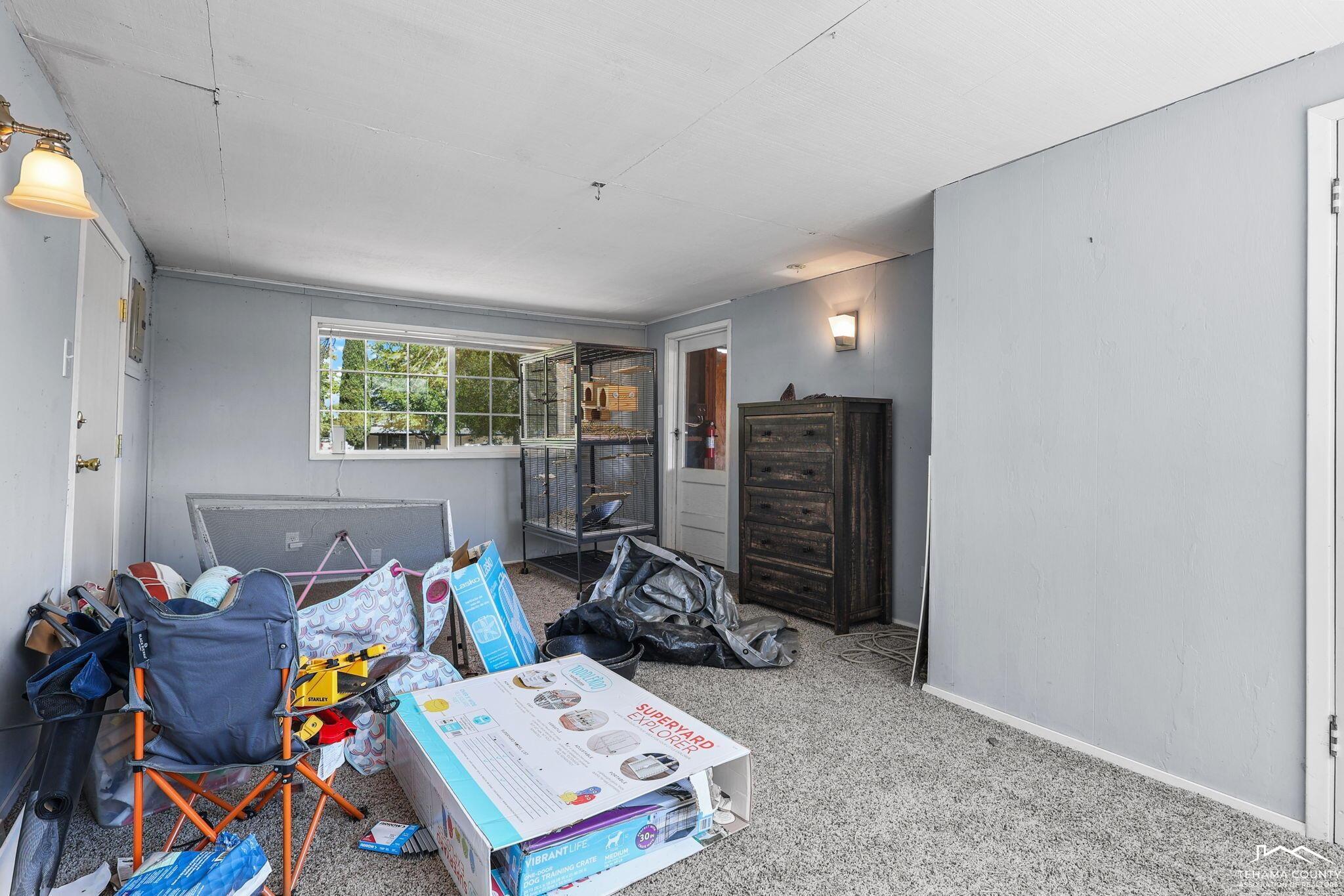 22275 Brent Road Red Bluff, CA 96080 - Photo 41 of 47 a bed room with furniture and a window