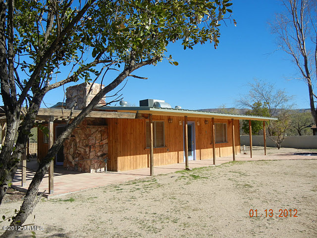 47421 North New River Road New River, AZ 85087 - Photo 11 of 23 a view of a backyard of the house