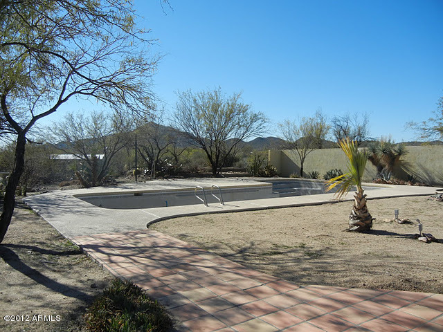 47421 North New River Road New River, AZ 85087 - Photo 12 of 23 a view of a swimming pool with a yard