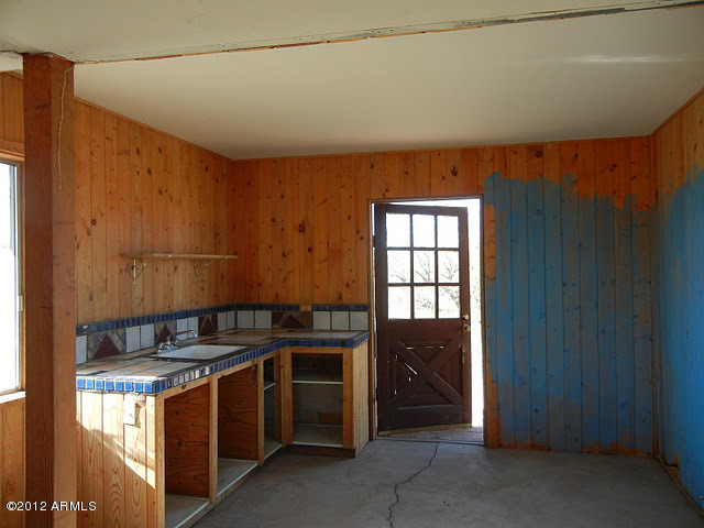 47421 North New River Road New River, AZ 85087 - Photo 20 of 23 a kitchen that has a sink and a stove