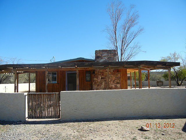 47421 North New River Road New River, AZ 85087 - Photo 3 of 23 a view of a house with a large window