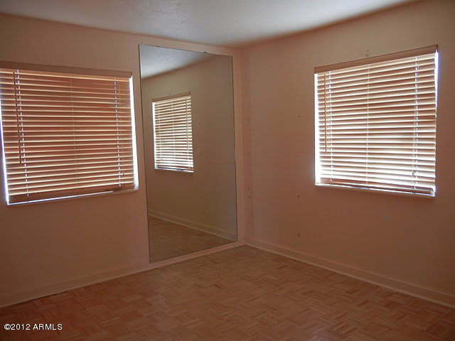 47421 North New River Road New River, AZ 85087 - Photo 9 of 23 a view of an empty room with a window