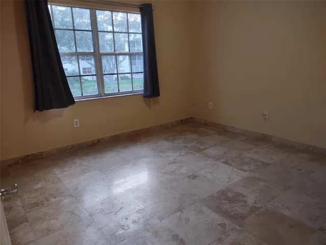 an empty room with a window