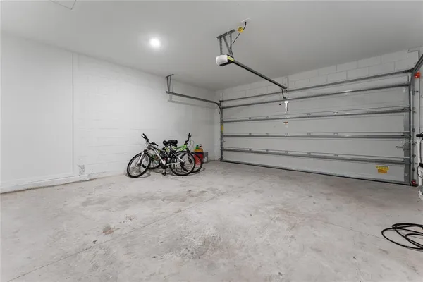 a view of a garage with the table and a chair